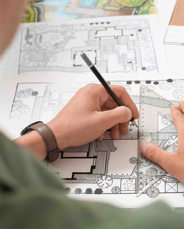 landscape designer drafting up project